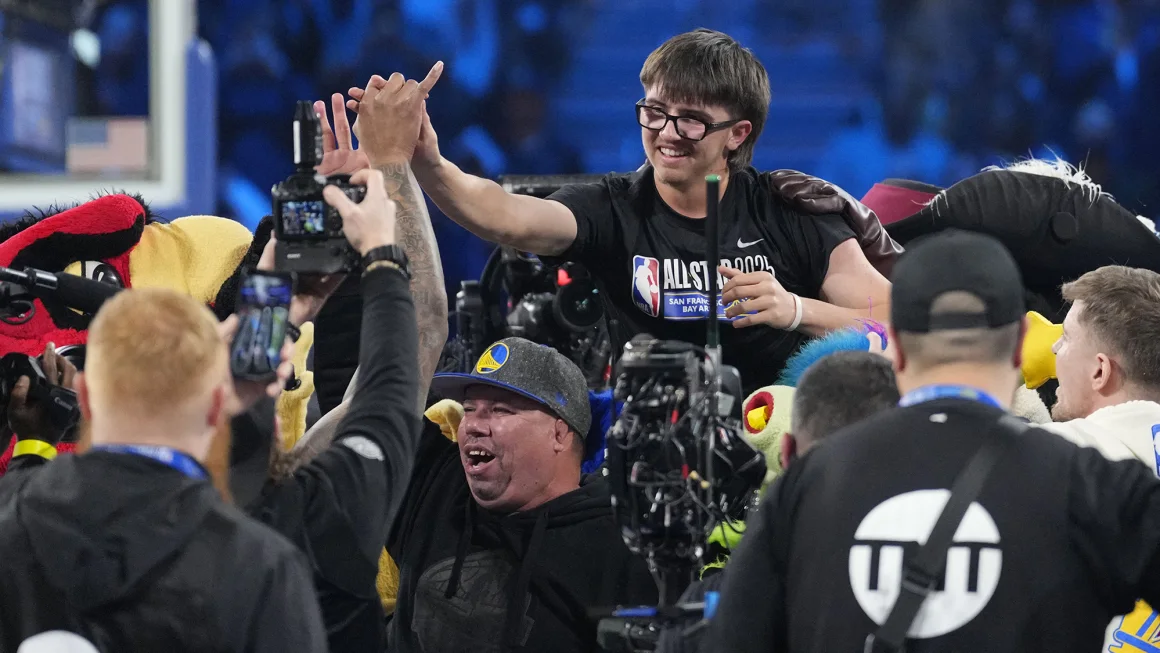 College Student Wins $100,000 by Outshooting Bucks Star Damian Lillard in Three-Point Challenge at NBA All-Star Weekend - gallery image 1